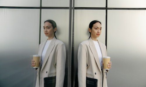 woman going to work office coffee mirror