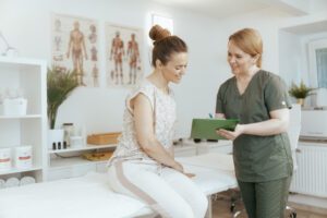 woman talking with her practitioner - non opioid alternatives to pain management