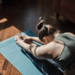 A woman practicing yoga.